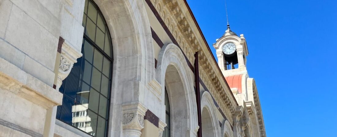 Clock tower and arched facade of the Central Market Hall in Sofia