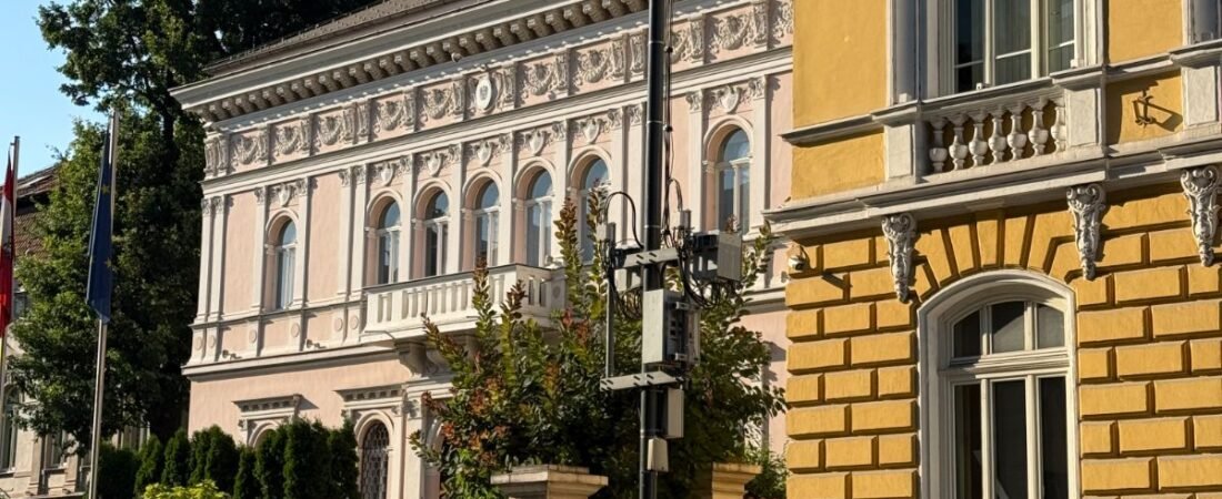 Pastel-coloured 19th-century buildings on a quiet Sofia street